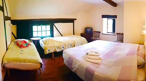 Our quadruple room with single beds. (K4)